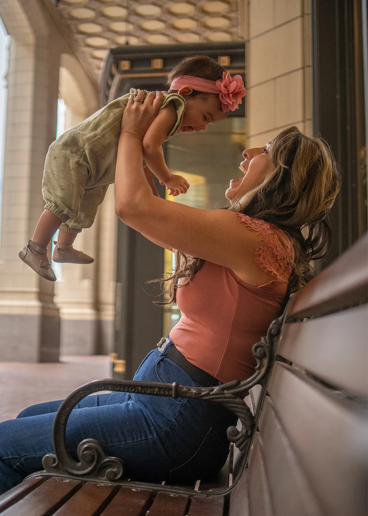 amanda-brand-strategist-with-baby-on-bench-up-high